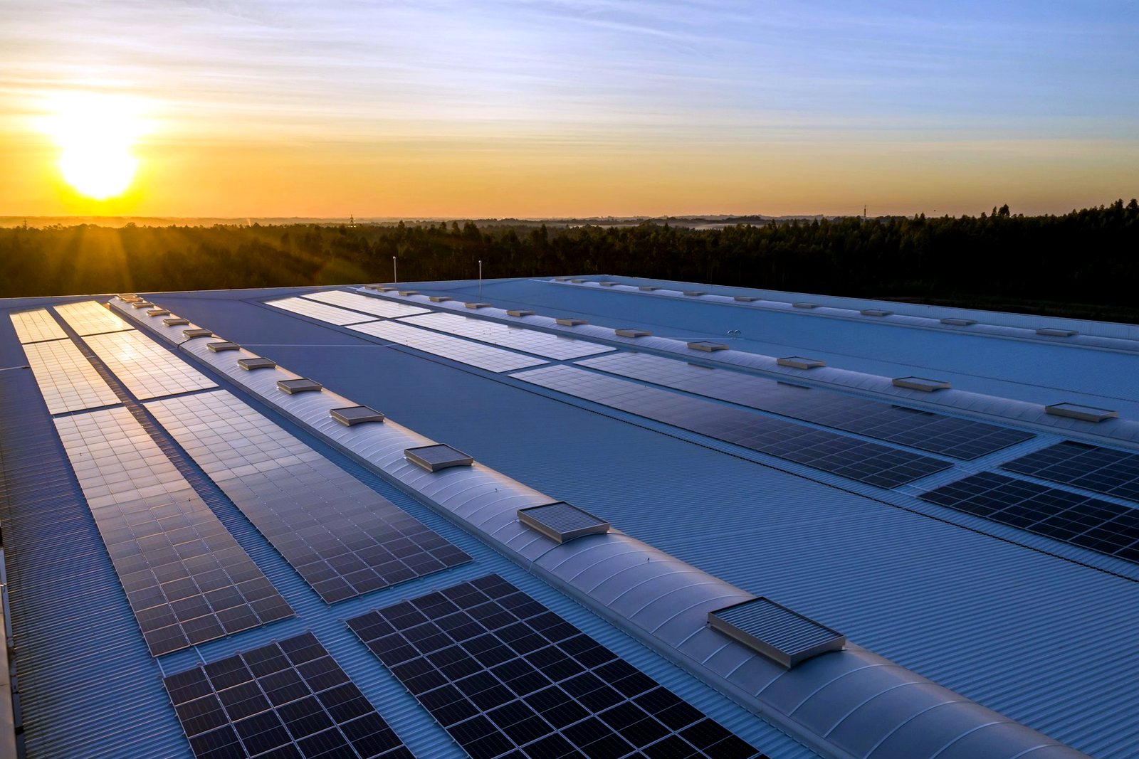 Engineer installing rooftop solar modules at Santex Products